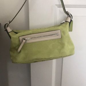 Small green coach purse